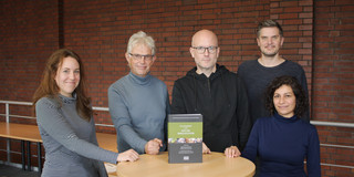 The publishers team with their publication