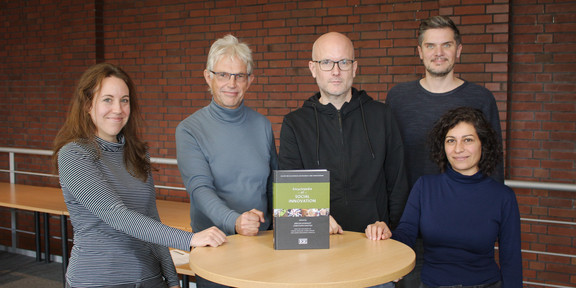 The publishers team with their publication