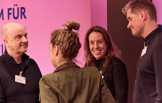 Ralf Kopp, Katrin Bauer, Marthe Zirngiebl und Daniel Krüger auf der SIGU-Plattform