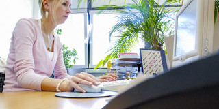 picture of a woman on a computer