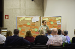 View from the audience onto a pasted metaplan wall