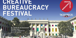 Hauptgebäude der Humboldt-Universität zu Berlin mit bunten Fenstern bei sonnigem Wetter. Schriftzug "Creative Buraucracy Festival". Darunter steht: "Sie arbeiten für das Gemeinwohl. Sie haben Ideen. Das ist kein Widerspruch. Das ist Ihr Festival."